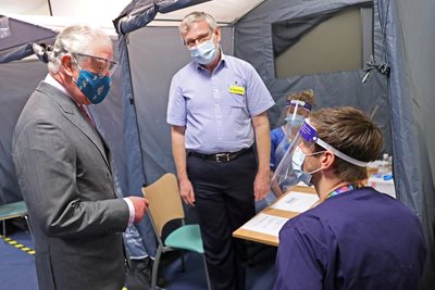 Prince Charles visited a vaccination center in Gloucester.  PHOTO: Reuters