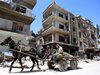 Сирийската армия подготвя с обстрел завземане на район южно от Дамаск
