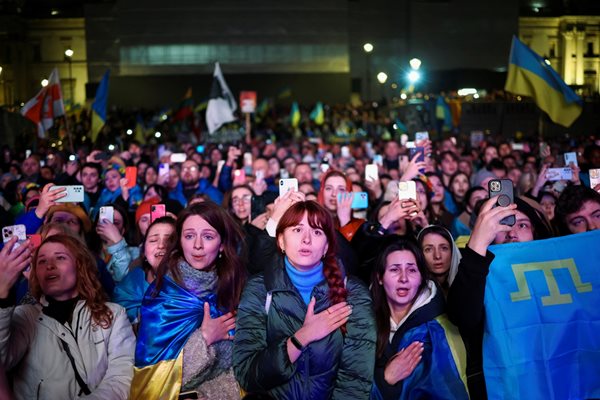 People attend a vigil for Ukraine held on the anniversary of the conflict with Russia, at Trafalgar Square in London, Britain February 23, 2023. REUTERS/Henry Nicholls