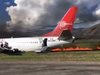 Самолет, превозващ 141 пътници, изгоря на пистата (Видео)