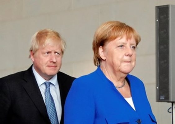 Борис Джонсън и Ангела Меркел СНИМКА: Ройтерс