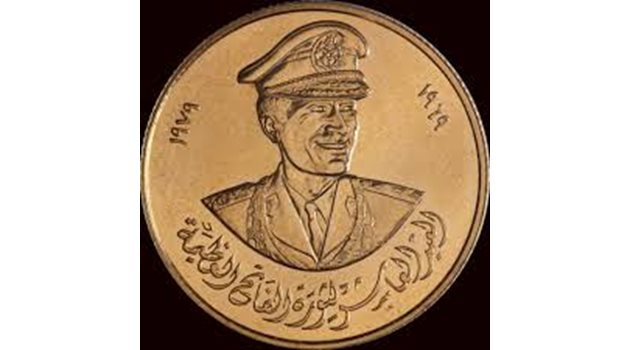 Полковник Кадафи планирал нова африканска валута, която да измести долара и франка.