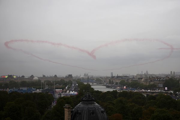 The French Air Force's elite aerobatic team, the Patrouille de France, painted a heart in the sky Picture: Reuters