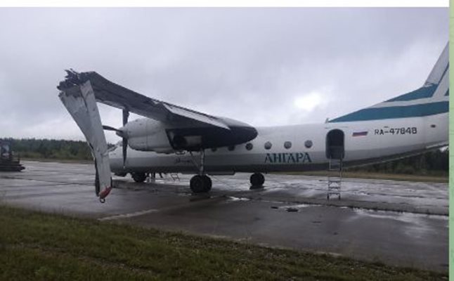 По време на кацане на летище Уст-Кут крилото на Ан-24 се е счупило на две. Снимка Телеграм/РИА новости
