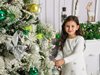 Дете под елхата: 6-годишната Рая от Видин  се радва на коледните подаръци