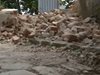 Бурен вятър събори стена от изоставена къща в Пловдив (Видео)