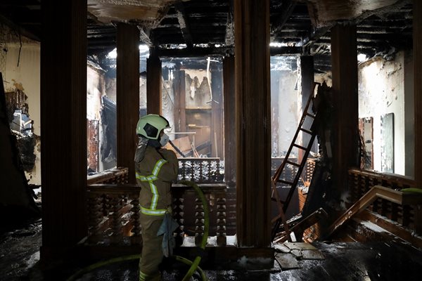 The facade of the burnt-out Copenhagen Stock Exchange partially collapsed PHOTO: Reuters