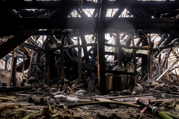 The facade of the burnt-out Copenhagen Stock Exchange partially collapsed PHOTO: Reuters