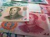 Рязкото поевтиняване на юана смекчава въздействието на търговската война