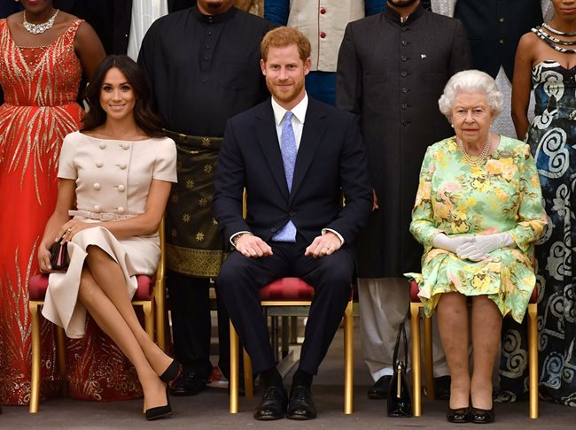 Принц Хари и Меган с кралица Елизабет Втора на прием в Бъкингам през 2018 г.