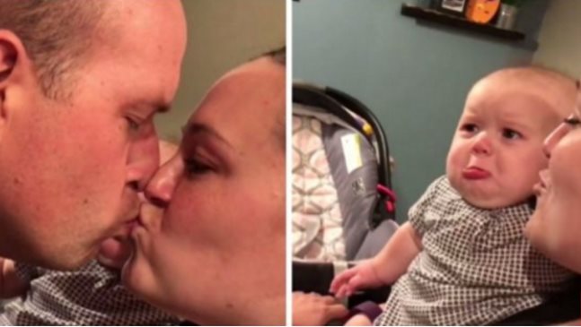 Бебе избухва в сълзи заради целувката на родителите си (Видео)