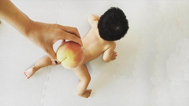 Хит в интернет: снимки на бебешки дупенца, покрити с прасковка